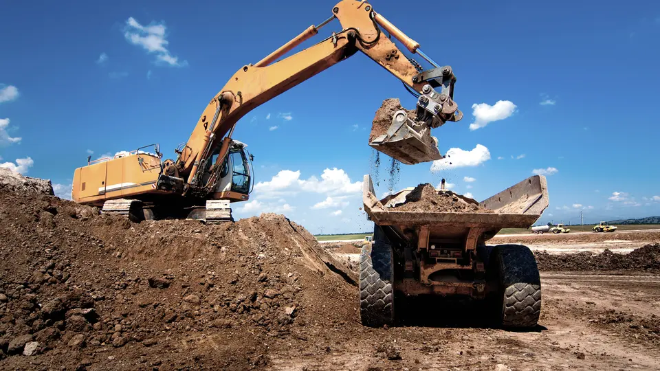 Trucks moving material for a Tread customer