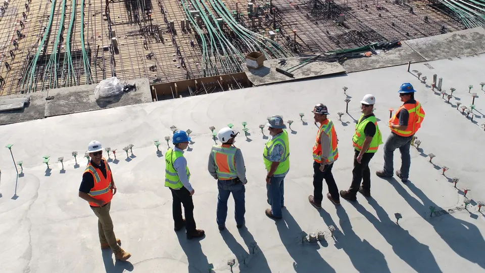 Contractor crew placing material